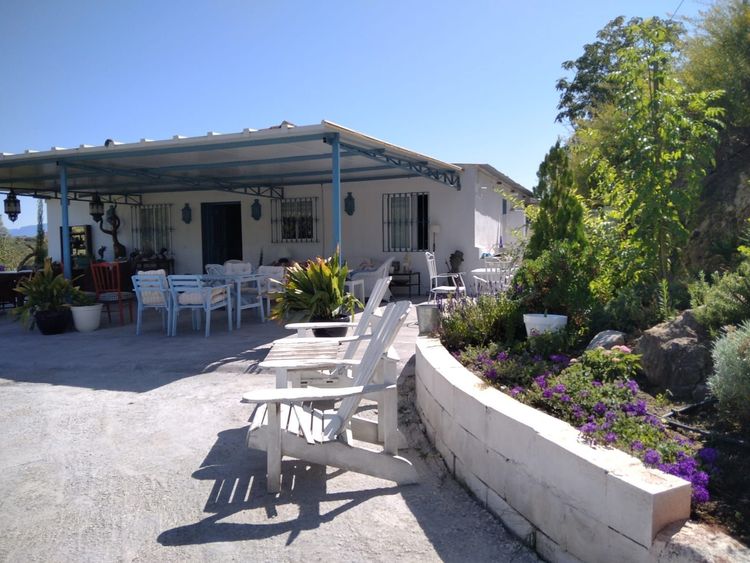 House | Resale in Guaro - Development photo 1